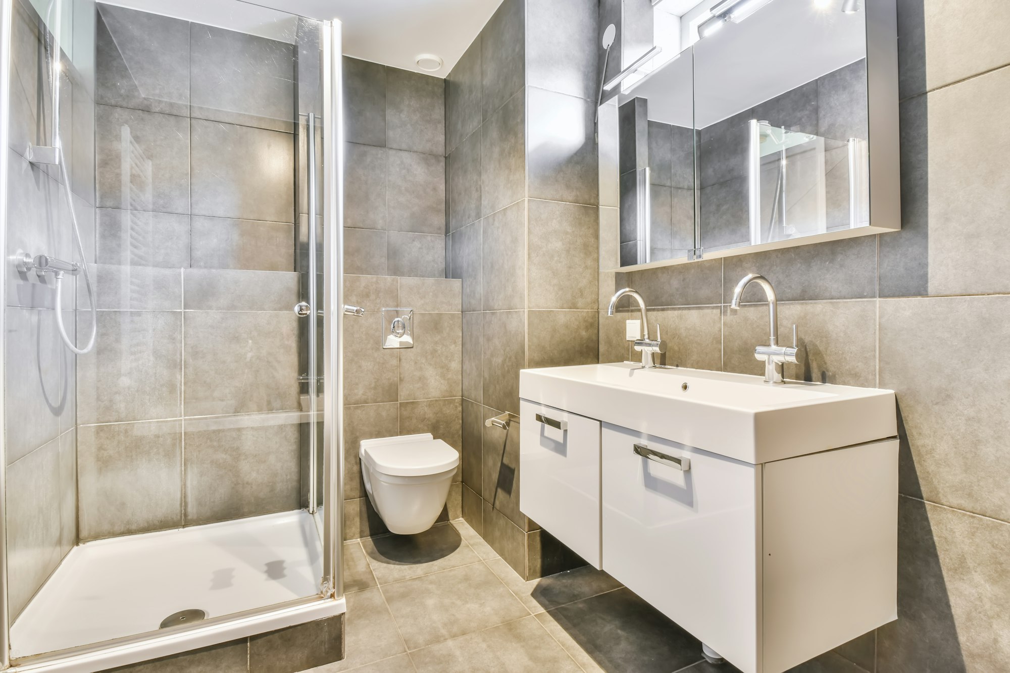 Interior of modern bathroom with toilet